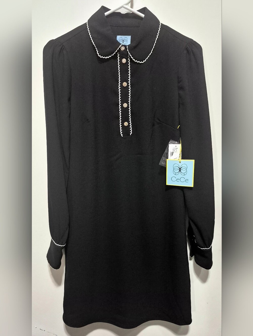CeCe Black Midi Dress with White Scalloped Trim and Jeweled Buttons.